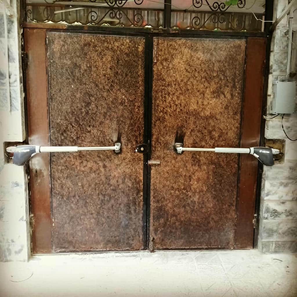نصب جک درب پارکینگ تنظیمات تخصصی در بیرجند