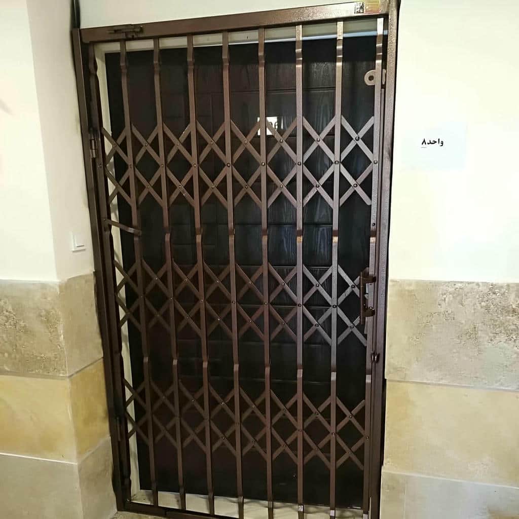 قیمت درب آکاردئونی فلزی تسمه تقویت‌شده در رشت