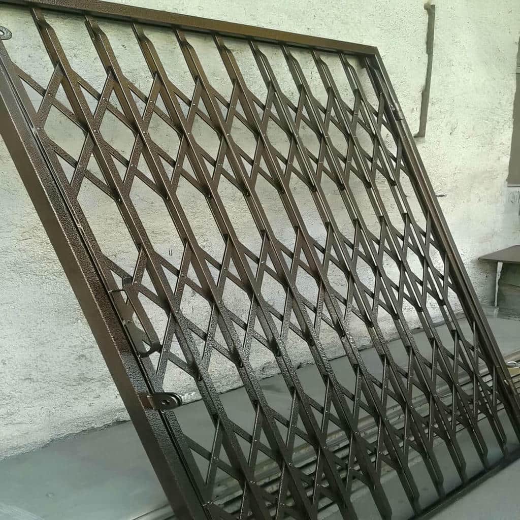 خرید درب آکاردئونی فلزی تسمه تقویت‌شده در گرگان