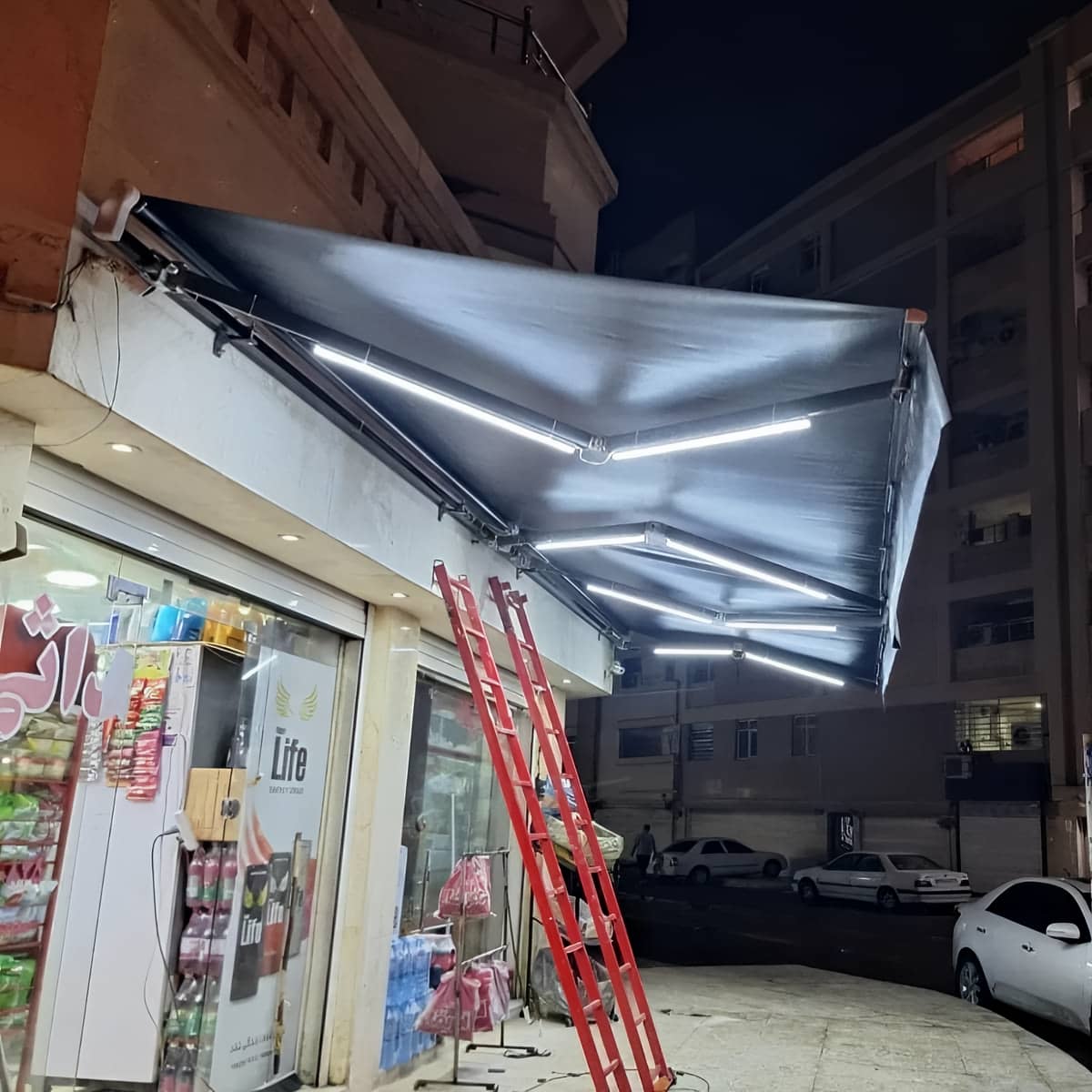 رنگ سایبان برقی فضای تجاری با نصب تراز رنگ سایبان برقی فضای تجاری با نصب تراز