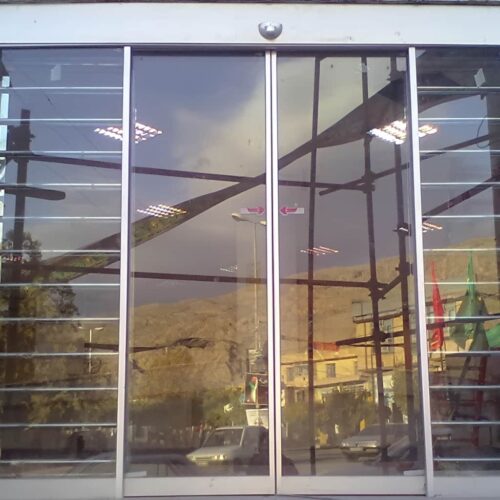 قیمت درب لولایی اتوماتیک شیشه ای