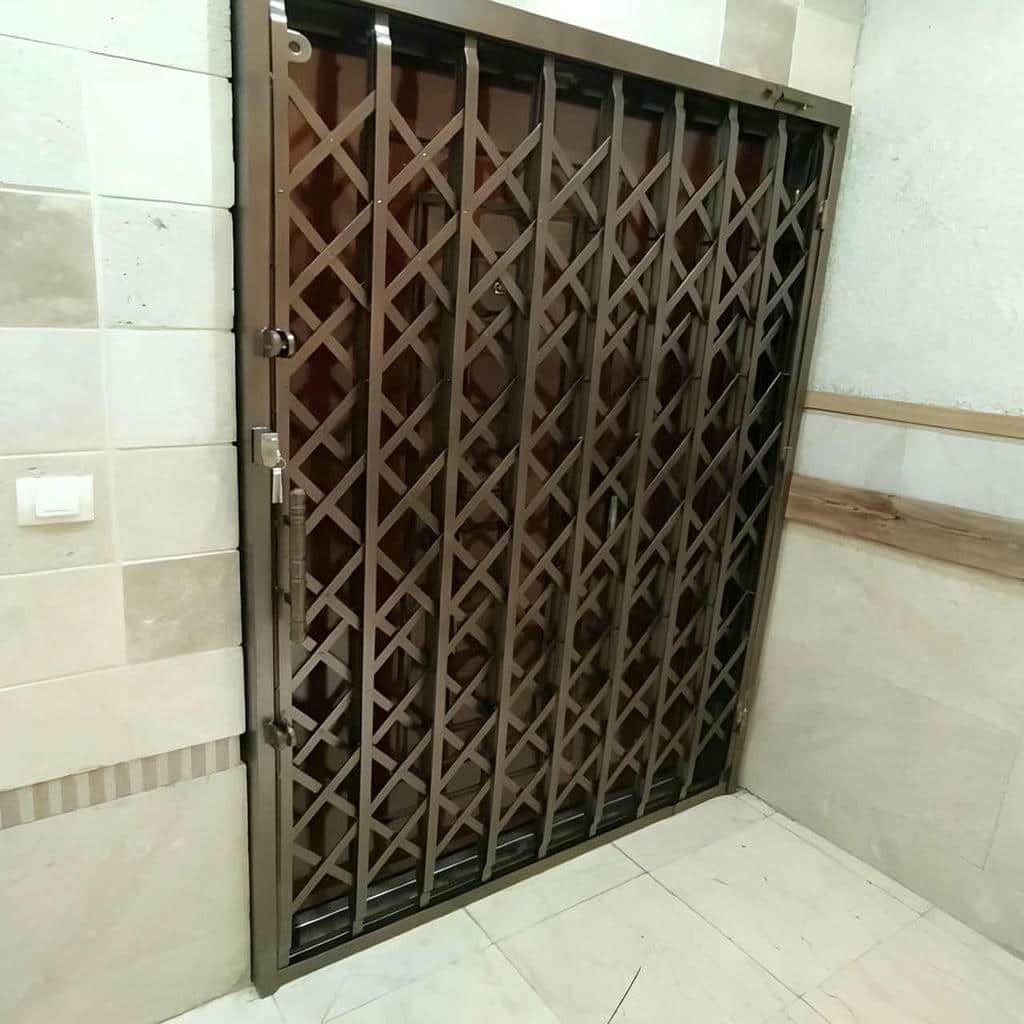 خدمات ساخت درب حفاظ فلزی ورودی واحد با تسمه مقاوم