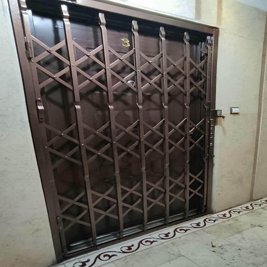 حفاظ آکاردئونی لوزی تسمه پهن با تسمه فلزی و رنگ کوره‌ای
